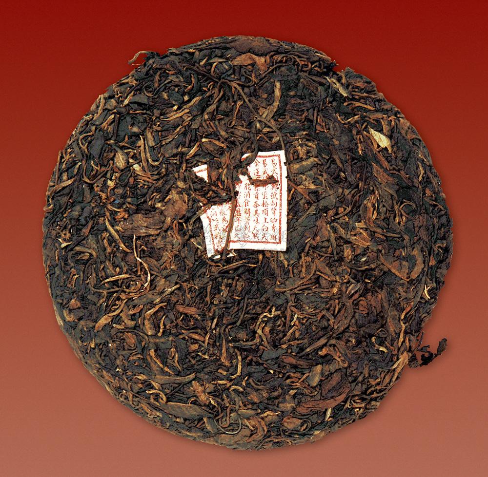 5311 约80年以上 厚内票同兴号圆茶 (一片)